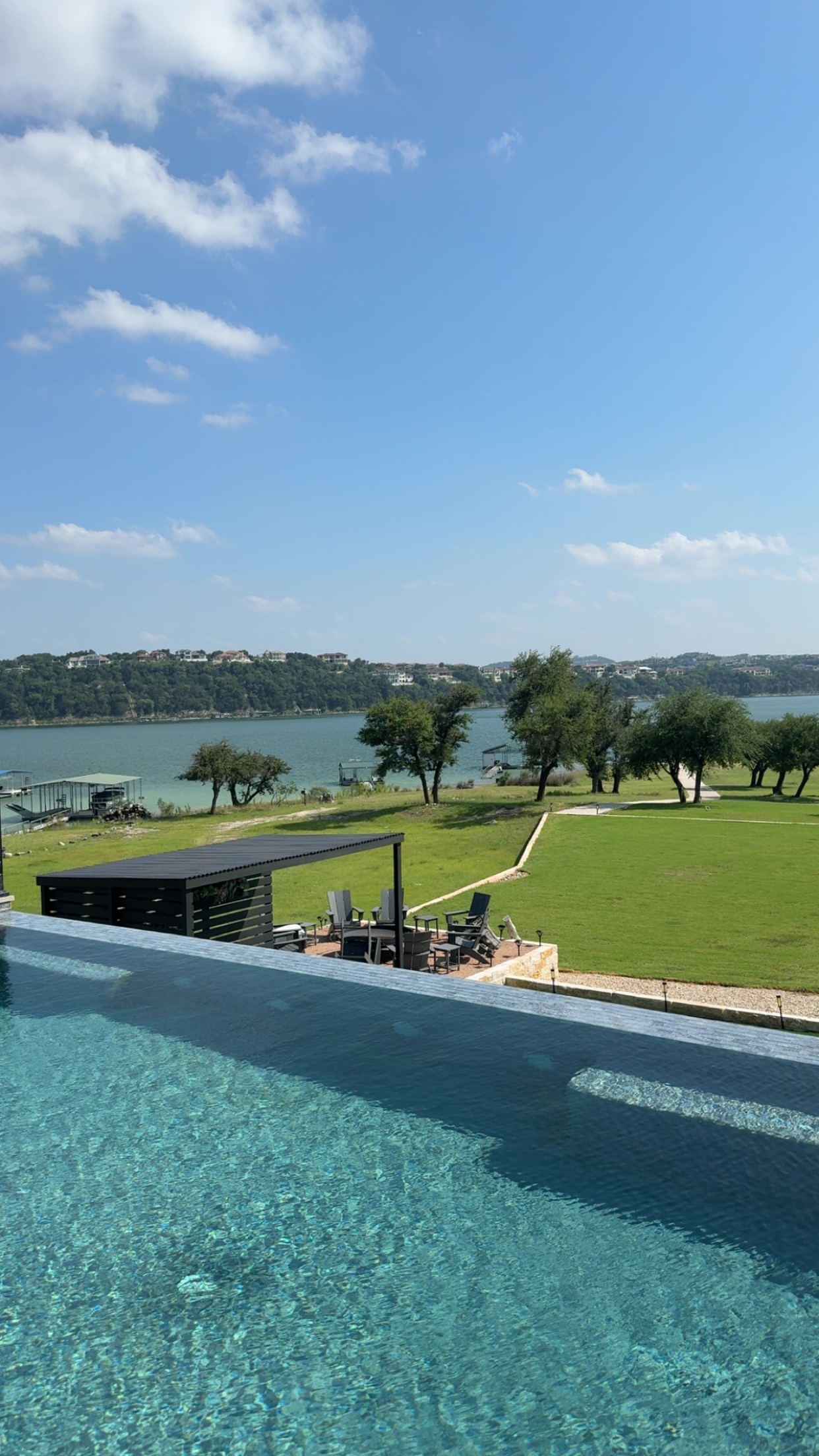 Clean lakefront infinity pool serviced in the Austin area